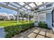 Outdoor patio with a green view and a white lattice fence at 454 Cerromar Rd # 172, Venice, FL 34293