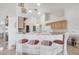 Spacious kitchen with breakfast bar, bright lighting, and ample countertop space at 5051 Greenway Dr, North Port, FL 34287