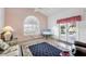 Cozy living room area with view of pool, vaulted ceiling, and lots of natural light at 5051 Greenway Dr, North Port, FL 34287