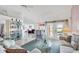 Inviting living room featuring comfortable seating and bright natural light at 5051 Greenway Dr, North Port, FL 34287