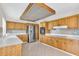 Spacious kitchen with stainless steel appliances and ample counter space at 5061 Richmond Ter, North Port, FL 34287