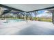 The screened-in pool area offers plenty of space for entertaining and relaxation at 5061 Richmond Ter, North Port, FL 34287