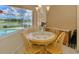 Cozy breakfast nook overlooking pool area at 5151 Pine Shadow Ln, North Port, FL 34287