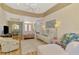 Open living space with views to dining room, front door, and lanai at 5151 Pine Shadow Ln, North Port, FL 34287