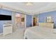 Relaxing bedroom featuring sliding glass doors to the backyard pool area at 5151 Pine Shadow Ln, North Port, FL 34287