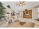 Spacious living room features neutral decor, tray ceilings, and an open layout, creating an inviting atmosphere at 560 Misty Pine Dr, Venice, FL 34292