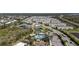 Aerial view of community amenities including pool, playground, tennis courts, ponds and convenient location at 5621 Blue Reef Pl, Nokomis, FL 34275