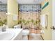 Bathroom featuring a white vanity, countertop basin, and a beach themed shower curtain at 6415 Midnight Pass Rd # 909, Sarasota, FL 34242
