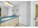 Bathroom featuring a vanity with ample storage and a white countertop basin at 6415 Midnight Pass Rd # 909, Sarasota, FL 34242