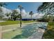 Outdoor shuffleboard court featuring lush landscaping at 6415 Midnight Pass Rd # 909, Sarasota, FL 34242