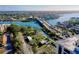 Expansive water view with a bridge, a canal, and colorful buildings in the distance on a clear day at 6415 Midnight Pass Rd # 909, Sarasota, FL 34242