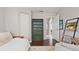 A bedroom with a bookshelf and a daybed at 648 Cypress Rd, Venice, FL 34293