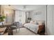 A cozy bedroom featuring a daybed, desk and chair at 648 Cypress Rd, Venice, FL 34293