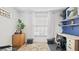 Bright office with a large window, stylish desk, and decorative rug at 648 Cypress Rd, Venice, FL 34293
