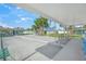 Well-maintained bocce ball court perfect for friendly competition and outdoor recreation with views of palm trees at 891 Grado Dr, Venice, FL 34285