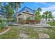 Clubhouse 2 boasts a beautiful entrance and landscaping, providing a welcoming focal point at 891 Grado Dr, Venice, FL 34285