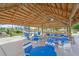 Inviting gazebo with ample seating and shade, offering a perfect spot for socializing and enjoying the outdoors at 891 Grado Dr, Venice, FL 34285