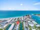 Aerial view showcasing waterfront condos with canal access and proximity to the Gulf of Mexico at 902 Gibbs Rd # 181, Venice, FL 34285