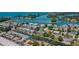 A stunning overhead view features waterfront condos with boating access and beautiful scenery at 902 Gibbs Rd # 181, Venice, FL 34285