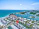 Aerial view of waterfront condo community near the Gulf of Mexico and serene canals at 902 Gibbs Rd # 181, Venice, FL 34285