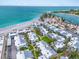 Coastal condo community with pool, lush landscaping, and direct access to the beach at 902 Gibbs Rd # 181, Venice, FL 34285