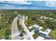 Aerial view of Beachwalk community featuring lush landscaping and walking trails at 9916 Bright Water Dr, Englewood, FL 34223