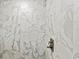 Close-up of a beautifully tiled shower showcasing luxurious design at 107 Corot Dr, Nokomis, FL 34275