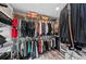Spacious walk-in closet with custom shelving for optimal organization at 107 Corot Dr, Nokomis, FL 34275