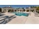 Beautiful community pool with covered seating areas, perfect for relaxation and socializing at 10768 Trophy Dr, Englewood, FL 34223