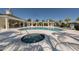 Community pool and jacuzzi offering luxury amenities and a serene environment for relaxation and recreation at 10768 Trophy Dr, Englewood, FL 34223