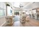 Open concept living room flowing into the kitchen with lots of natural light at 11917 Hunters Creek Rd, Venice, FL 34293