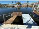 Image of the home's private wooden docks on the tranquil canal at 12613 4Th Isle, Hudson, FL 34667