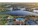 Beautiful aerial view of a Primary-planned community with lakes, amenities, and luxurious homes at 13867 Vadini St, Venice, FL 34293