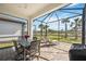 Covered lanai area perfect for outdoor dining and relaxation with beautiful views at 13867 Vadini St, Venice, FL 34293