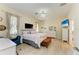 Spacious bedroom with neutral tones, luxury vinyl flooring, and a comfortable layout at 161 Valencia Lakes Dr, Venice, FL 34292