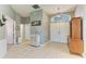 Spacious foyer with tile flooring and classic decor at 161 Valencia Lakes Dr, Venice, FL 34292