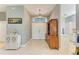 Open foyer featuring tile floors, modern lighting, and ample space at 161 Valencia Lakes Dr, Venice, FL 34292