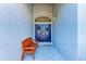 Inviting entryway with a bench and stylish front door at 161 Valencia Lakes Dr, Venice, FL 34292