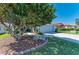 Charming front yard featuring manicured landscaping at 161 Valencia Lakes Dr, Venice, FL 34292