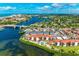 Stunning aerial shot of Madeira Beach with a waterfront property and intercoastal waterway at 1636 Stickney Point Rd # 36-201, Sarasota, FL 34231