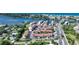 A beautiful aerial view of condos near the water and John's Pass bridge in Madeira Beach, Florida at 1636 Stickney Point Rd # 36-201, Sarasota, FL 34231