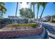 Well-maintained community entrance with lush landscaping and clear signage for Castel Del Mare at 1636 Stickney Point Rd # 36-201, Sarasota, FL 34231