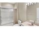 Bathroom featuring a shower-tub combination, sink with vanity, and ample lighting at 1697 San Silvestro Dr, Venice, FL 34285