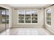 Light-filled room with a large picture window offering serene views of the water, bringing nature indoors at 1697 San Silvestro Dr, Venice, FL 34285