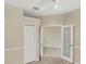 Home office featuring neutral paint and carpeted floors at 1697 San Silvestro Dr, Venice, FL 34285