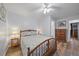 Comfortable bedroom with a wooden bed frame, neutral bedding, and a wooden dresser at 1703 Bal Harbour Dr # 2, Venice, FL 34293