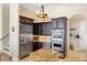 Modern kitchen with stainless steel Viking appliances and granite countertops at 19227 Palmdale Ct, Port Charlotte, FL 33948