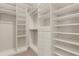 Organized walk-in closet with ample shelving and storage space at 19340 Bluff Dr, Venice, FL 34292