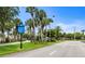 Street view featuring signage directing towards Venice Beach, boat ramp and other attractions at 19340 Bluff Dr, Venice, FL 34292