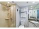 Bathroom featuring a shower with glass door and granite vanity top at 232 Saint Augustine Ave # 207, Venice, FL 34285